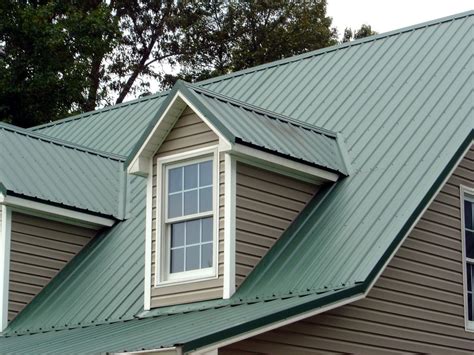 green metal roof white house|white standing seam metal roof.